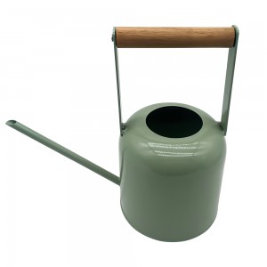 Colorful galvanized metal watering can with wood handle